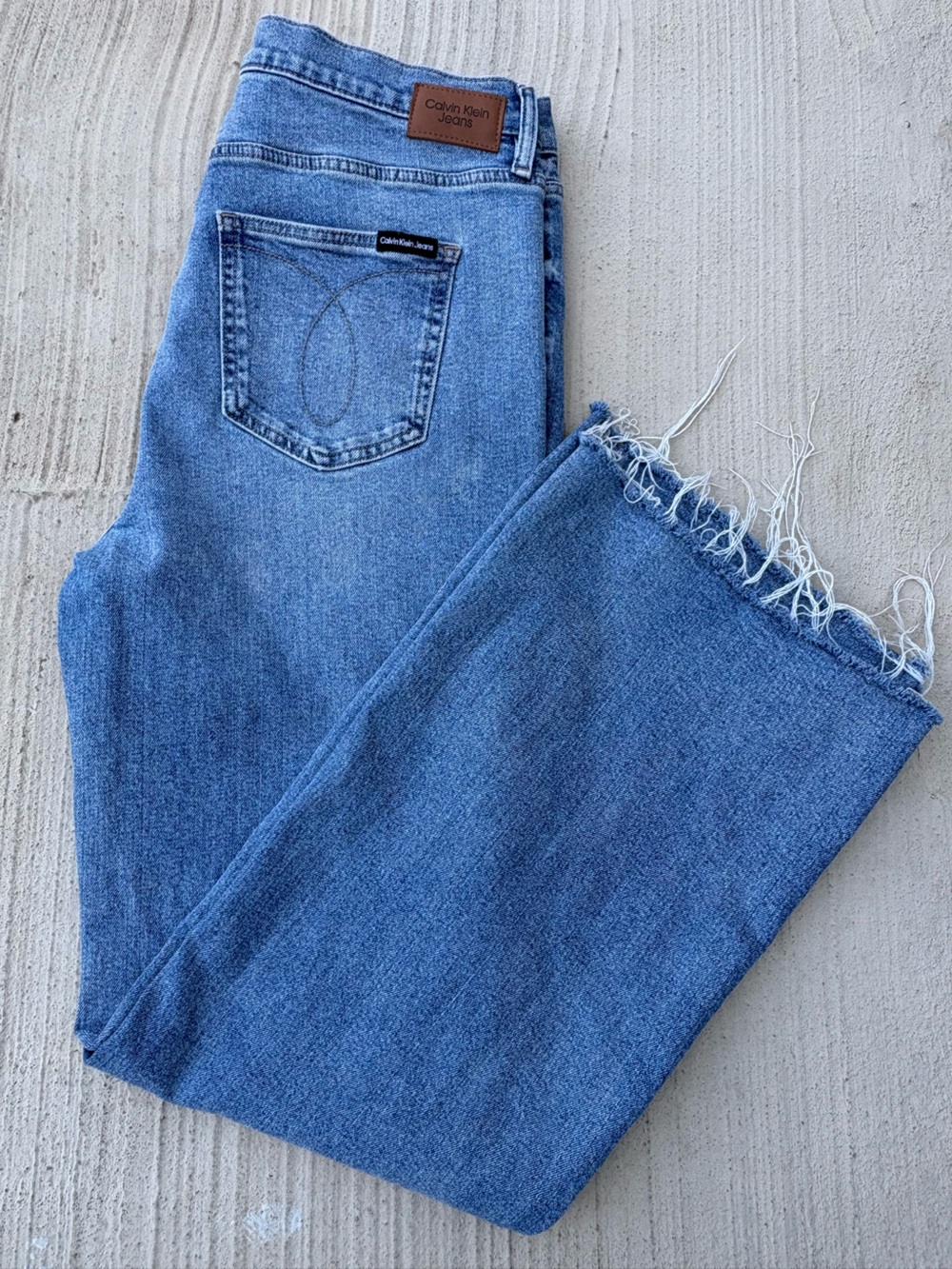 Classic Calvin Klein Blue Women's Denim Jeans with Frayed Hem
